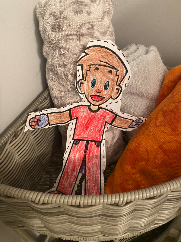 Flat Stanley hiding in the towels