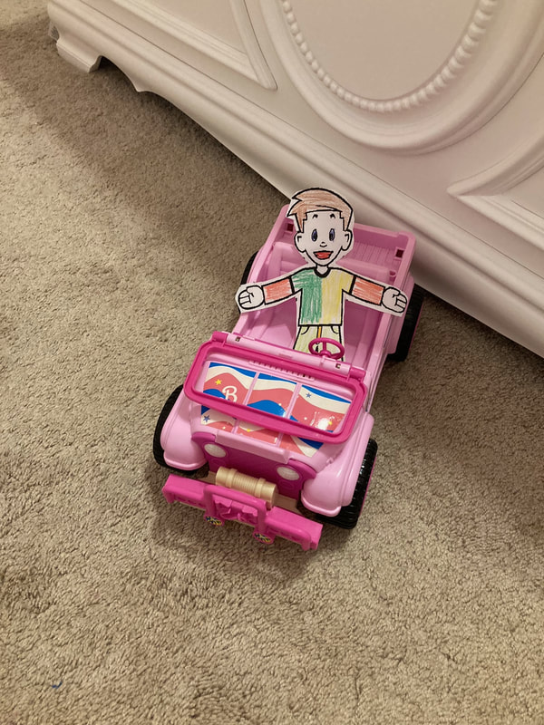 Flat Stanly in the Barbie car